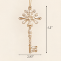White and gold snowflake key Christmas ornament with size measurements