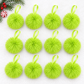 12 pack of fuzzy lime green pom-pom Christmas ornaments with ribbon loops