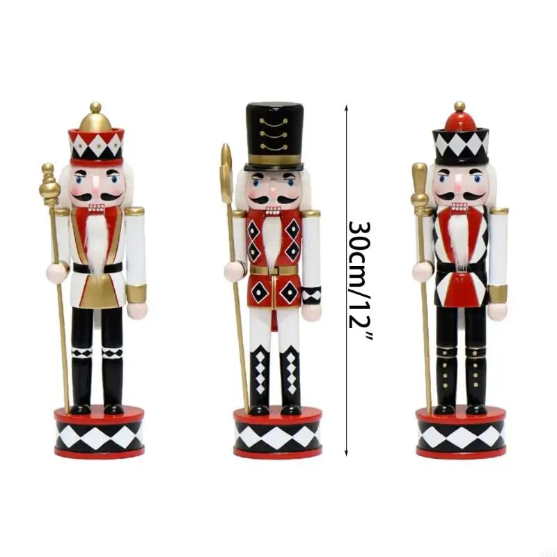 Hand-painted wooden nutcracker set of 3 on white background, each 30 cm (12 in) tall