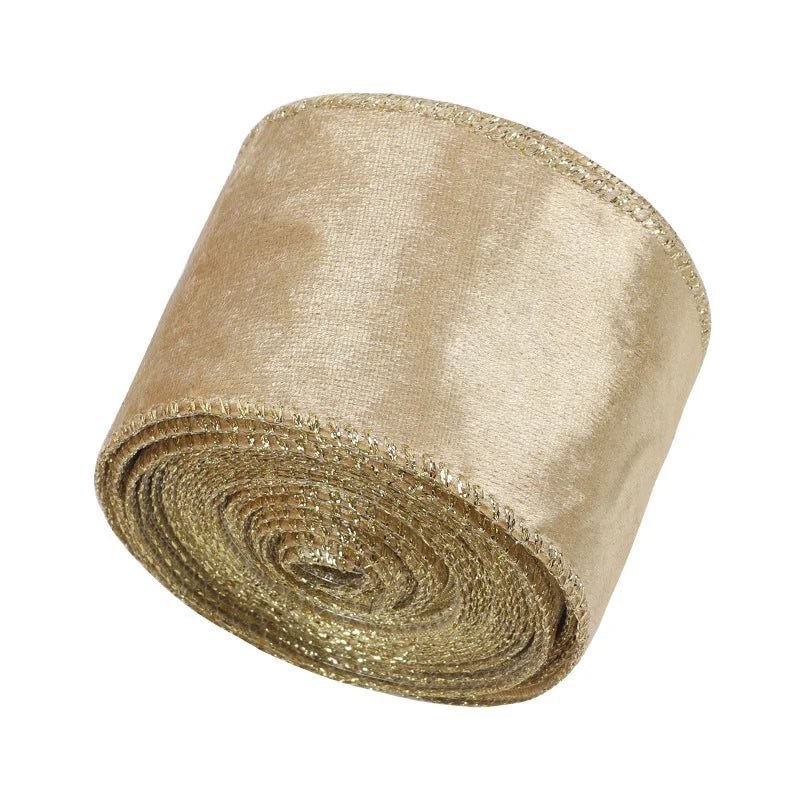 Roll of champagne gold Christmas ribbon with gold edge